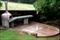 Wood-fired pizza oven, polished concrete bench-top, paving, landscaping, creative